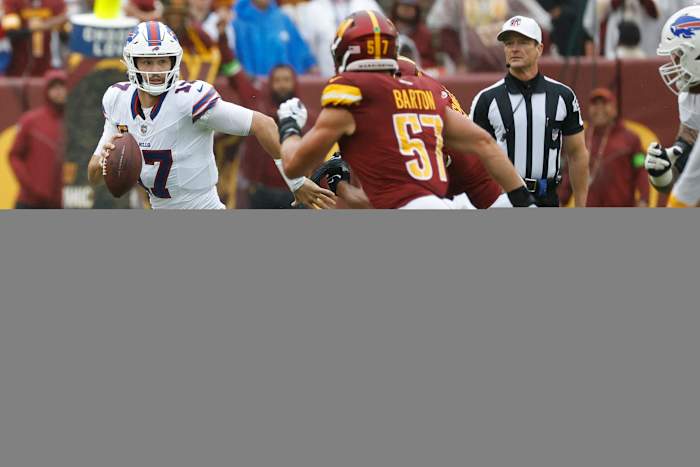 Buffalo Bills quarterback Josh Allen running against the Washington Commanders.